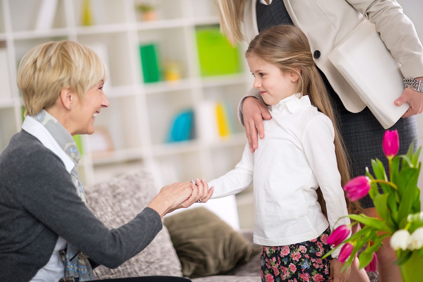 female foster care provider meeting foster child in comfortable room